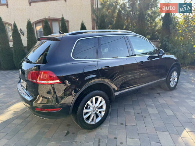 Фольксваген Туарег 2013 в Черновцах на Automoto.ua Черный Фольксваген Туарег, объемом двигателя 2.97 л и пробегом 276 тыс. км за 18900 $, фото 22 на Automoto.ua