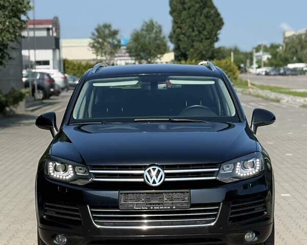 Черный Фольксваген Туарег, объемом двигателя 2.97 л и пробегом 240 тыс. км за 21500 $, фото 1 на Automoto.ua