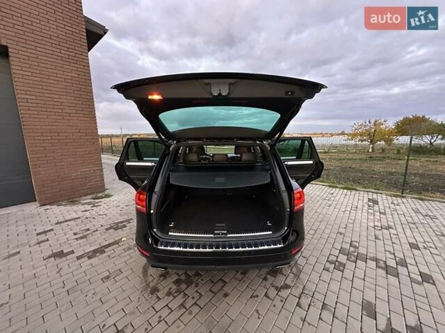 Фольксваген Туарег 2013 в Луцке на Automoto.ua Черный Фольксваген Туарег, объемом двигателя 2.97 л и пробегом 227 тыс. км за 22900 $, фото 12 на Automoto.ua