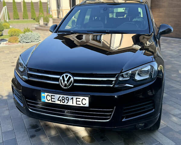 Фольксваген Туарег 2013 в Черновцах на Automoto.ua Черный Фольксваген Туарег, объемом двигателя 2.97 л и пробегом 276 тыс. км за 18900 $, фото 16 на Automoto.ua