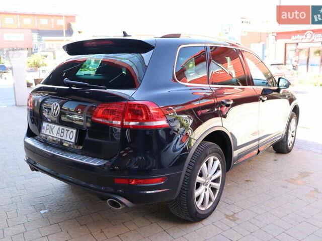 Черный Фольксваген Туарег, объемом двигателя 3 л и пробегом 142 тыс. км за 22900 $, фото 2 на Automoto.ua