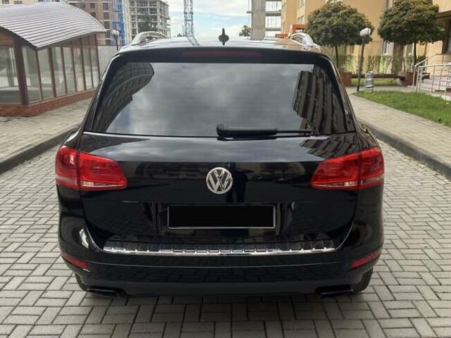 Фольксваген Туарег 2013 в Черновцах на Automoto.ua Черный Фольксваген Туарег, объемом двигателя 2.97 л и пробегом 250 тыс. км за 19900 $, фото 12 на Automoto.ua