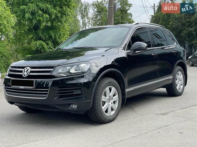 Чорний Фольксваген Туарег, об'ємом двигуна 2.97 л та пробігом 196 тис. км за 23500 $, фото 1 на Automoto.ua