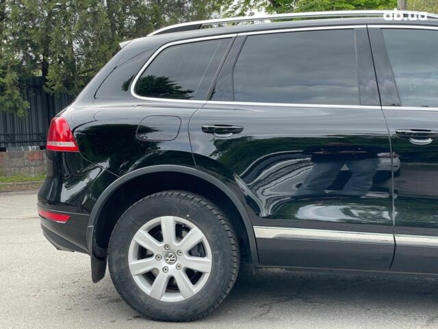 Чорний Фольксваген Туарег, об'ємом двигуна 3 л та пробігом 197 тис. км за 27490 $, фото 7 на Automoto.ua