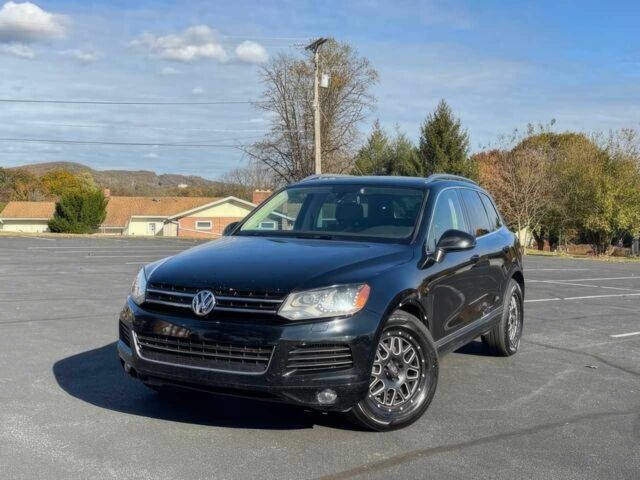 Черный Фольксваген Туарег, объемом двигателя 3 л и пробегом 86 тыс. км за 9900 $, фото 2 на Automoto.ua