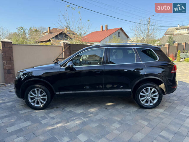 Фольксваген Туарег 2013 в Черновцах на Automoto.ua Черный Фольксваген Туарег, объемом двигателя 2.97 л и пробегом 276 тыс. км за 18900 $, фото 7 на Automoto.ua