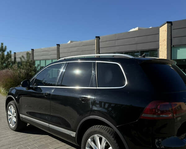 Черный Фольксваген Туарег, объемом двигателя 3 л и пробегом 213 тыс. км за 22300 $, фото 10 на Automoto.ua