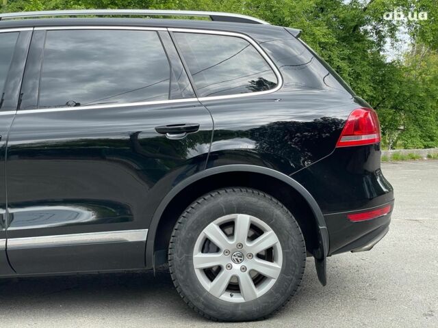Чорний Фольксваген Туарег, об'ємом двигуна 3 л та пробігом 197 тис. км за 27490 $, фото 13 на Automoto.ua