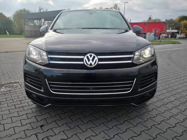 Черный Фольксваген Туарег, объемом двигателя 4.2 л и пробегом 89 тыс. км за 8700 $, фото 1 на Automoto.ua