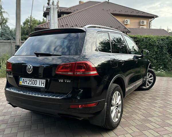 Черный Фольксваген Туарег, объемом двигателя 2.97 л и пробегом 342 тыс. км за 18000 $, фото 2 на Automoto.ua