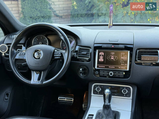 Фольксваген Туарег 2013 в Черновцах на Automoto.ua Черный Фольксваген Туарег, объемом двигателя 2.97 л и пробегом 276 тыс. км за 18900 $, фото 56 на Automoto.ua