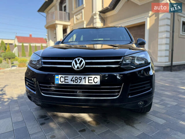 Фольксваген Туарег 2013 в Черновцах на Automoto.ua Черный Фольксваген Туарег, объемом двигателя 2.97 л и пробегом 276 тыс. км за 18900 $, фото 14 на Automoto.ua