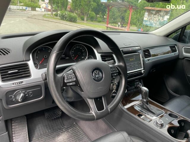 Чорний Фольксваген Туарег, об'ємом двигуна 3 л та пробігом 197 тис. км за 27490 $, фото 23 на Automoto.ua