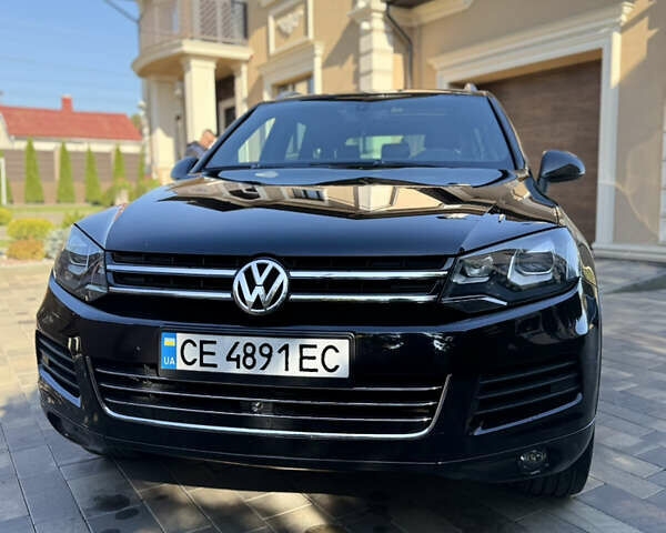 Фольксваген Туарег 2013 в Черновцах на Automoto.ua Черный Фольксваген Туарег, объемом двигателя 2.97 л и пробегом 276 тыс. км за 18900 $, фото 15 на Automoto.ua