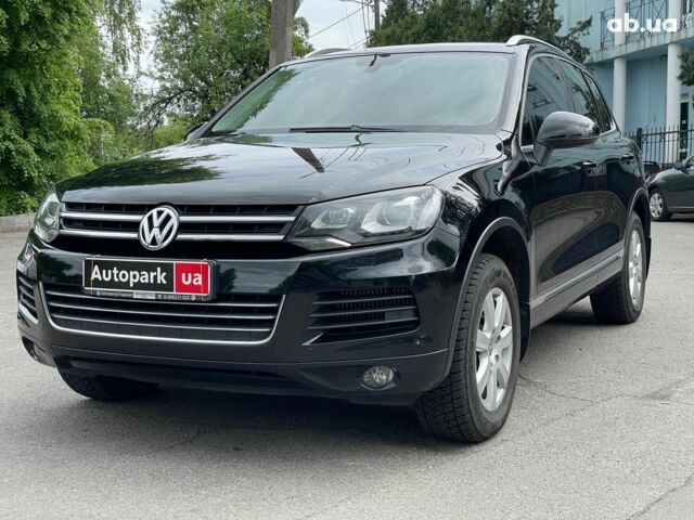 Чорний Фольксваген Туарег, об'ємом двигуна 3 л та пробігом 197 тис. км за 27490 $, фото 1 на Automoto.ua