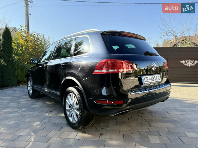 Фольксваген Туарег 2013 в Черновцах на Automoto.ua Черный Фольксваген Туарег, объемом двигателя 2.97 л и пробегом 276 тыс. км за 18900 $, фото 26 на Automoto.ua