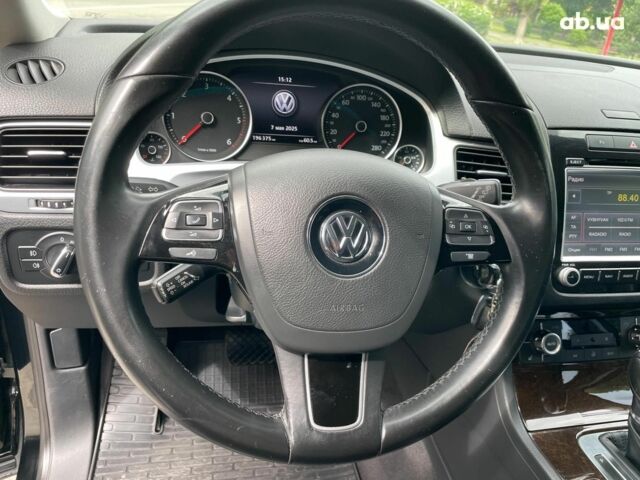 Чорний Фольксваген Туарег, об'ємом двигуна 3 л та пробігом 197 тис. км за 27490 $, фото 26 на Automoto.ua