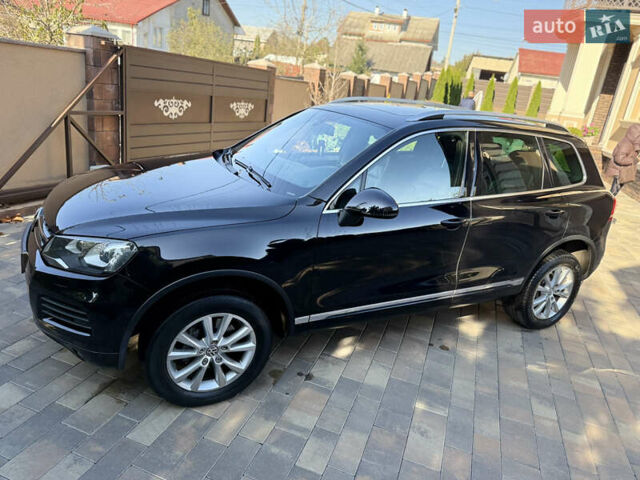 Фольксваген Туарег 2013 в Черновцах на Automoto.ua Черный Фольксваген Туарег, объемом двигателя 2.97 л и пробегом 276 тыс. км за 18900 $, фото 32 на Automoto.ua