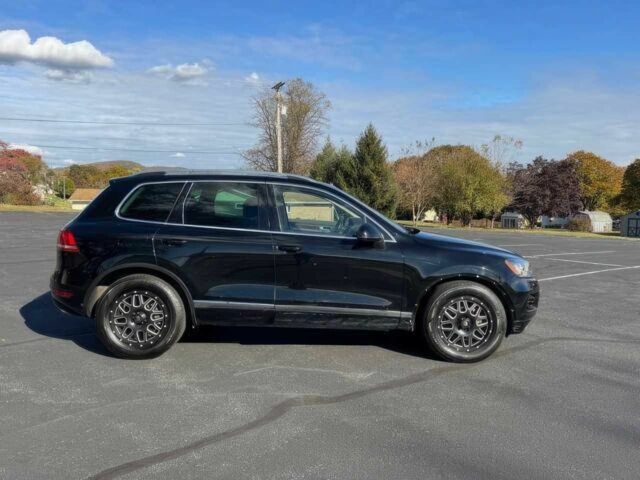 Черный Фольксваген Туарег, объемом двигателя 3 л и пробегом 86 тыс. км за 9900 $, фото 4 на Automoto.ua