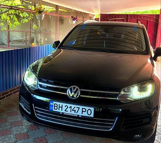 Черный Фольксваген Туарег, объемом двигателя 3 л и пробегом 199 тыс. км за 19800 $, фото 1 на Automoto.ua