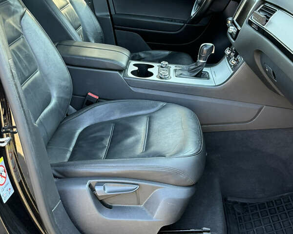 Фольксваген Туарег 2013 в Черновцах на Automoto.ua Черный Фольксваген Туарег, объемом двигателя 2.97 л и пробегом 276 тыс. км за 18900 $, фото 48 на Automoto.ua