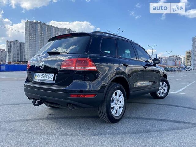 Черный Фольксваген Туарег, объемом двигателя 3 л и пробегом 223 тыс. км за 25500 $, фото 1 на Automoto.ua