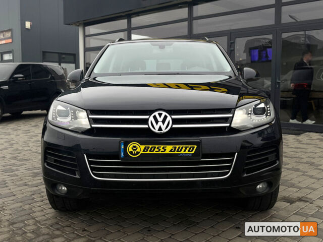 Чорний Фольксваген Туарег, об'ємом двигуна 3 л та пробігом 272 тис. км за 22990 $, фото 1 на Automoto.ua