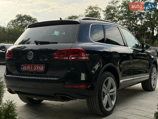 Чорний Фольксваген Туарег, об'ємом двигуна 3 л та пробігом 289 тис. км за 24900 $, фото 3 на Automoto.ua
