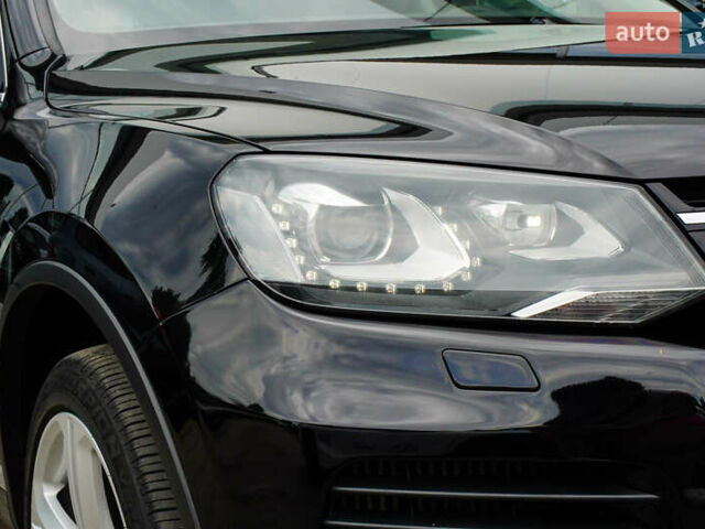 Черный Фольксваген Туарег, объемом двигателя 3 л и пробегом 236 тыс. км за 24999 $, фото 1 на Automoto.ua