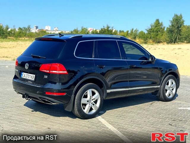 Черный Фольксваген Туарег, объемом двигателя 3 л и пробегом 184 тыс. км за 21800 $, фото 2 на Automoto.ua