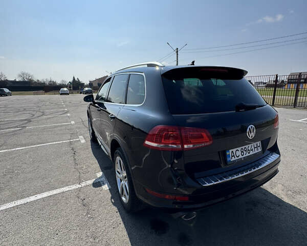Черный Фольксваген Туарег, объемом двигателя 2.97 л и пробегом 257 тыс. км за 24000 $, фото 4 на Automoto.ua