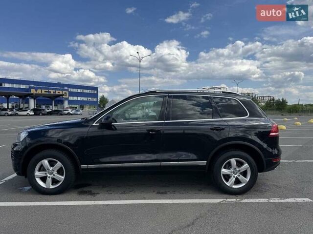 Чорний Фольксваген Туарег, об'ємом двигуна 3 л та пробігом 195 тис. км за 20950 $, фото 1 на Automoto.ua