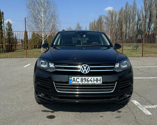 Черный Фольксваген Туарег, объемом двигателя 2.97 л и пробегом 257 тыс. км за 24000 $, фото 1 на Automoto.ua