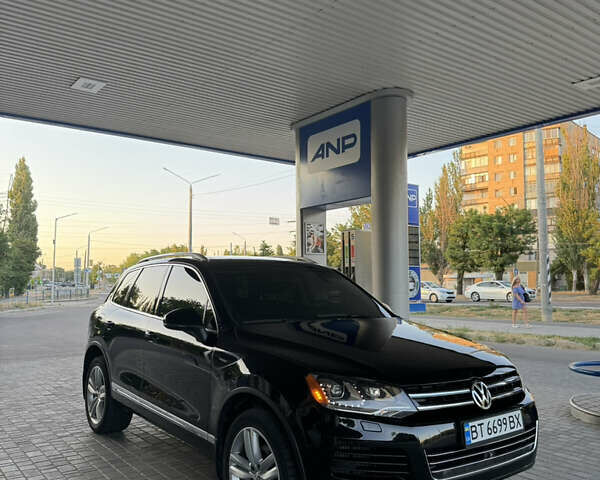 Чорний Фольксваген Туарег, об'ємом двигуна 2.97 л та пробігом 400 тис. км за 19300 $, фото 1 на Automoto.ua