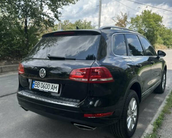 Черный Фольксваген Туарег, объемом двигателя 2.97 л и пробегом 189 тыс. км за 28000 $, фото 2 на Automoto.ua