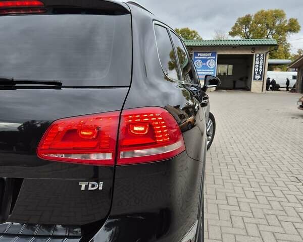 Черный Фольксваген Туарег, объемом двигателя 3 л и пробегом 330 тыс. км за 19999 $, фото 3 на Automoto.ua