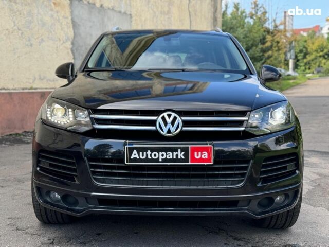 Черный Фольксваген Туарег, объемом двигателя 3 л и пробегом 200 тыс. км за 25790 $, фото 1 на Automoto.ua