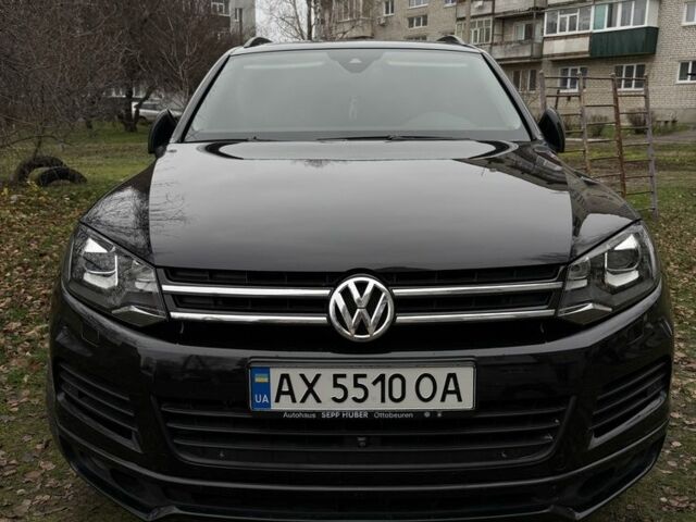 Черный Фольксваген Туарег, объемом двигателя 3 л и пробегом 250 тыс. км за 25000 $, фото 1 на Automoto.ua