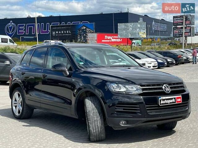 Чорний Фольксваген Туарег, об'ємом двигуна 3 л та пробігом 231 тис. км за 23680 $, фото 2 на Automoto.ua