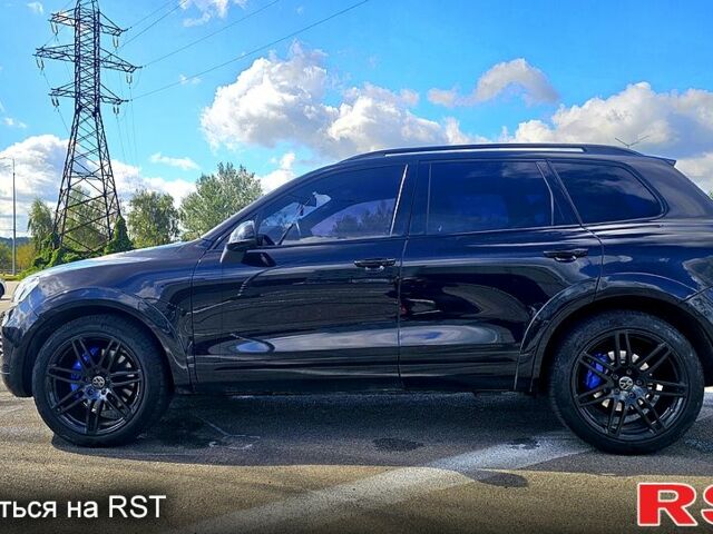 Черный Фольксваген Туарег, объемом двигателя 4.2 л и пробегом 330 тыс. км за 19999 $, фото 1 на Automoto.ua