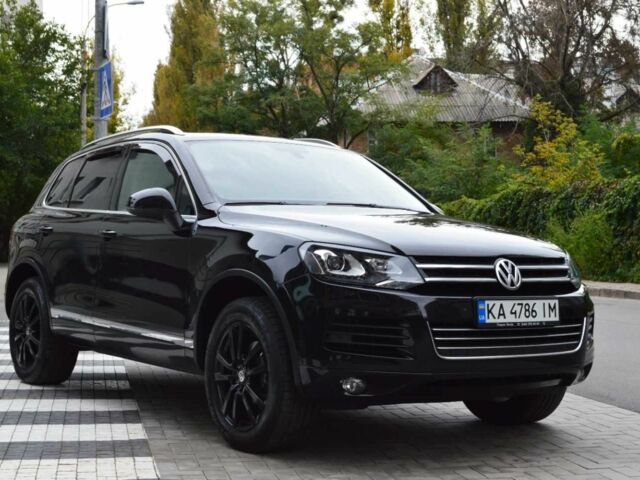 Черный Фольксваген Туарег, объемом двигателя 3 л и пробегом 256 тыс. км за 18900 $, фото 2 на Automoto.ua