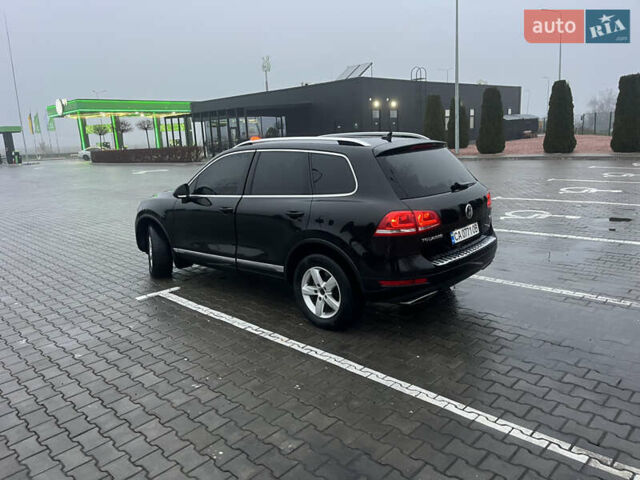 Черный Фольксваген Туарег, объемом двигателя 3 л и пробегом 265 тыс. км за 21500 $, фото 2 на Automoto.ua