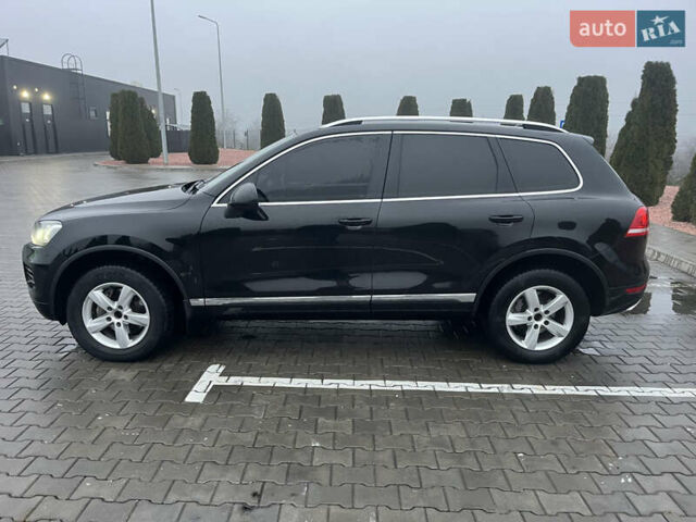 Черный Фольксваген Туарег, объемом двигателя 3 л и пробегом 265 тыс. км за 21500 $, фото 3 на Automoto.ua