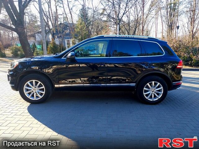 Чорний Фольксваген Туарег, об'ємом двигуна 3 л та пробігом 172 тис. км за 30999 $, фото 1 на Automoto.ua