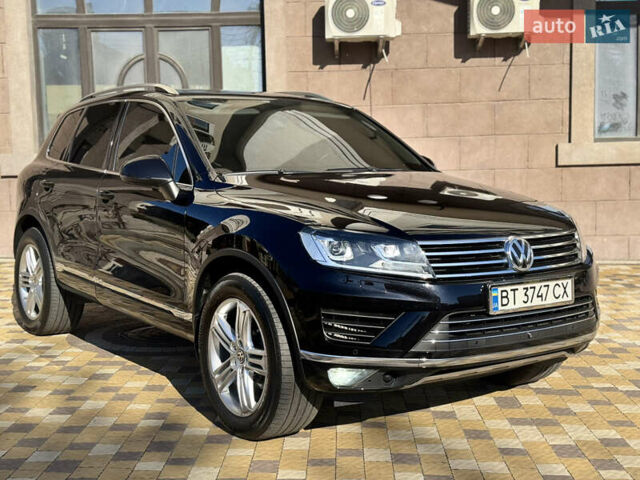 Черный Фольксваген Туарег, объемом двигателя 2.97 л и пробегом 216 тыс. км за 27400 $, фото 1 на Automoto.ua