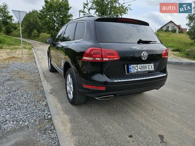 Черный Фольксваген Туарег, объемом двигателя 3 л и пробегом 236 тыс. км за 21600 $, фото 2 на Automoto.ua