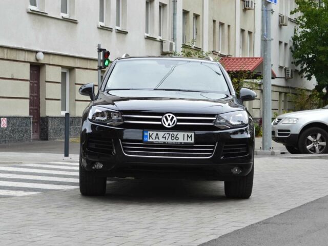 Черный Фольксваген Туарег, объемом двигателя 3 л и пробегом 256 тыс. км за 18900 $, фото 1 на Automoto.ua