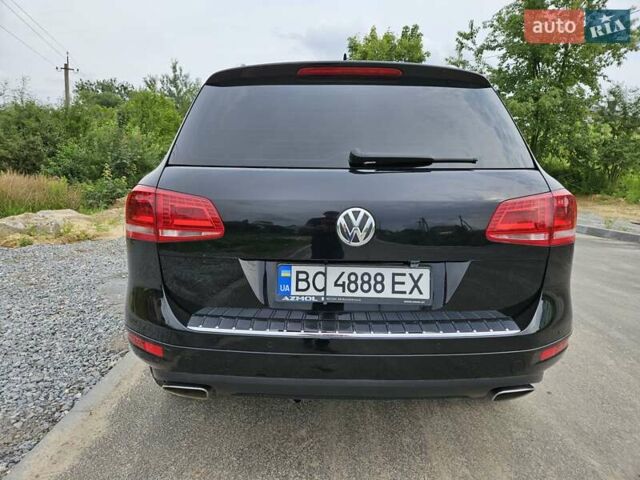 Черный Фольксваген Туарег, объемом двигателя 3 л и пробегом 236 тыс. км за 21600 $, фото 1 на Automoto.ua