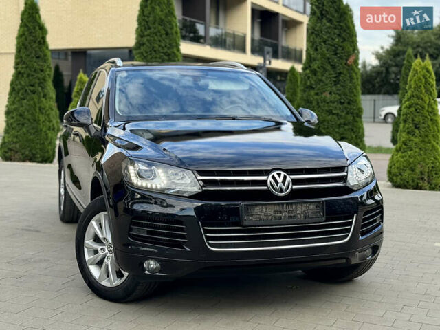 Черный Фольксваген Туарег, объемом двигателя 2.97 л и пробегом 150 тыс. км за 28500 $, фото 1 на Automoto.ua