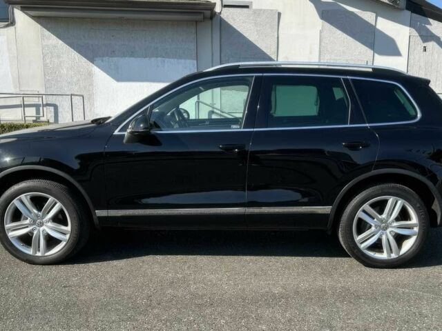 Чорний Фольксваген Туарег, об'ємом двигуна 3 л та пробігом 86 тис. км за 22000 $, фото 4 на Automoto.ua